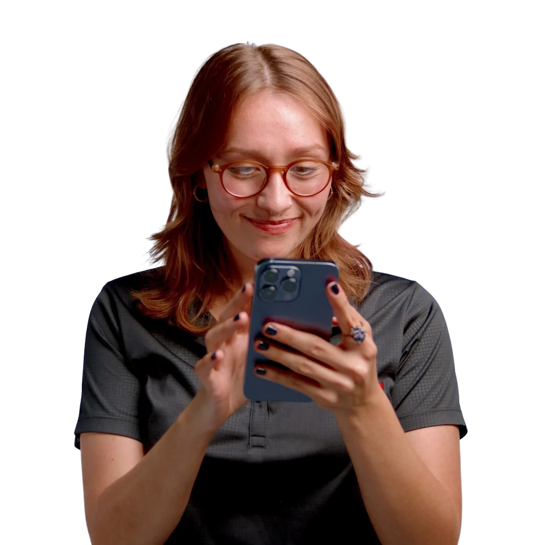 Byte Federal team member preparing a mobile wallet before an ATM visit